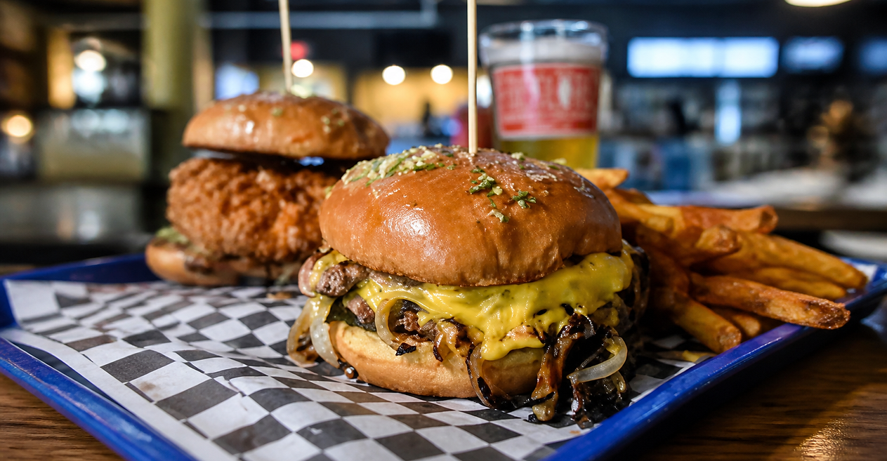 STACKED smash burger and crispy chicken sandwich with fries